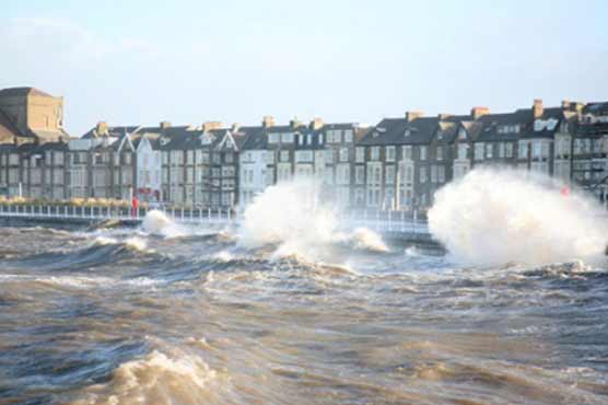 Britain evacuates thousands after storm surge