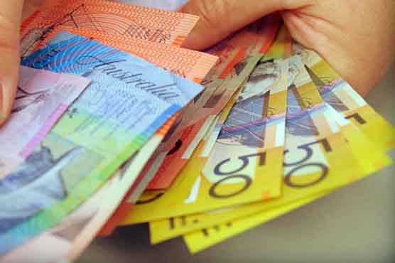 Australian dollar hits three-year low 