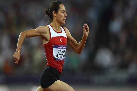 Athletics: Olympic champ exonerated over doping 
