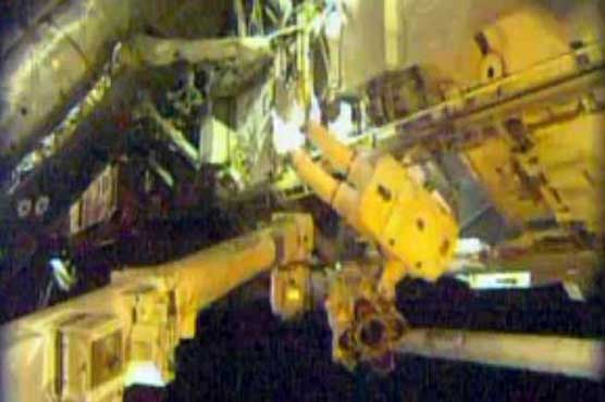 US astronauts steps out on spacewalk for stations repairs
