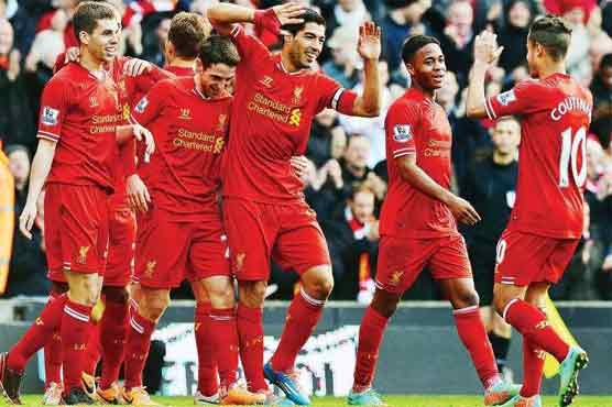 Football: Liverpool go top, City rally, United roll on