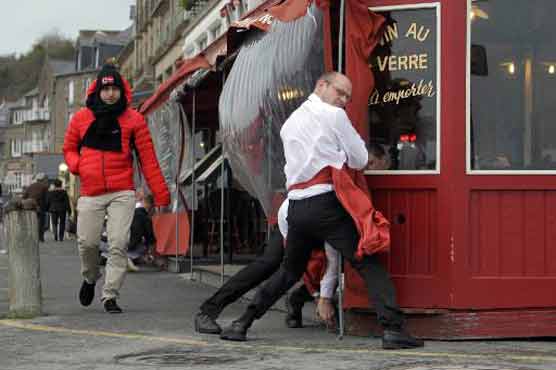 Two dead as high winds, rain lash Europe