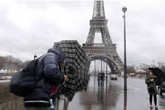 Storm batter Britain, France, disrupting travel, power