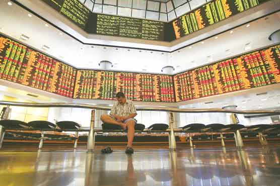 Asian markets mixed, dollar rises to 5-year high