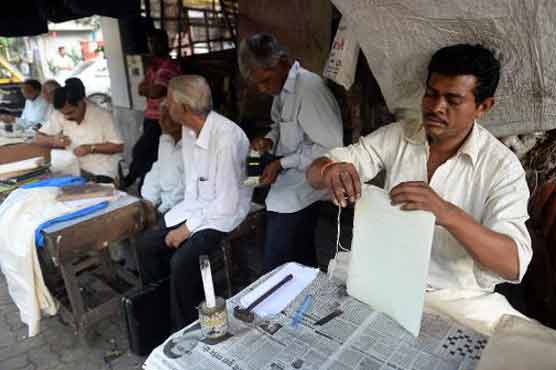 India's last generation of letter writers signs out 