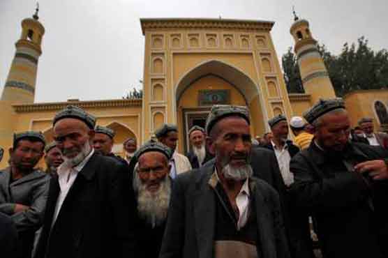 Uighur group urges probe into Xinjiang violence 