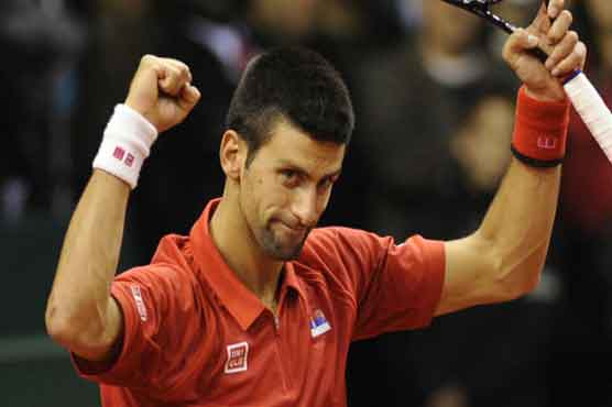Tennis: Djokovic cruise through on 'worst court' 
