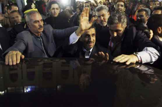 Four held after shoe throwing at Ahmadinejad 