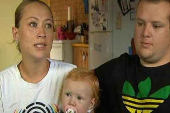 Thief abandons car after finding baby on back seat 