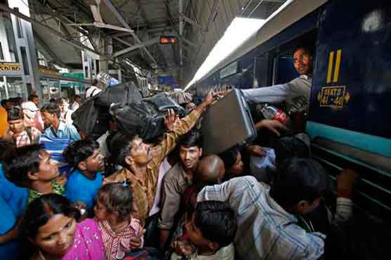 At least 15 dead in India train station stampede 