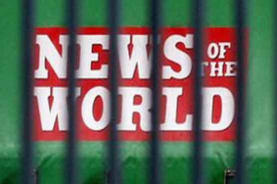 UK police arrest 6 journalists for phone hacking 