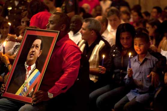 Photos of Hugo Chavez shown after 2-month absence
