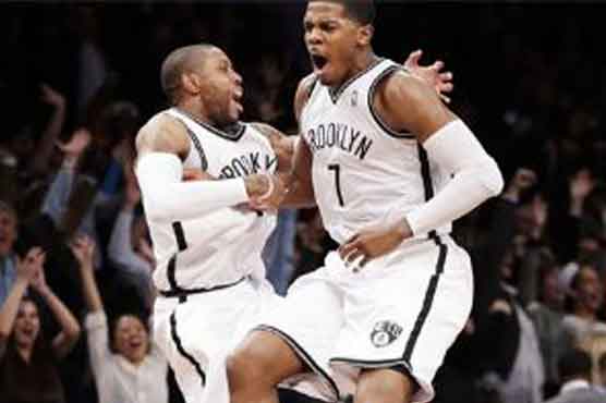 Johnson shines as Nets edge Bucks in OT 
