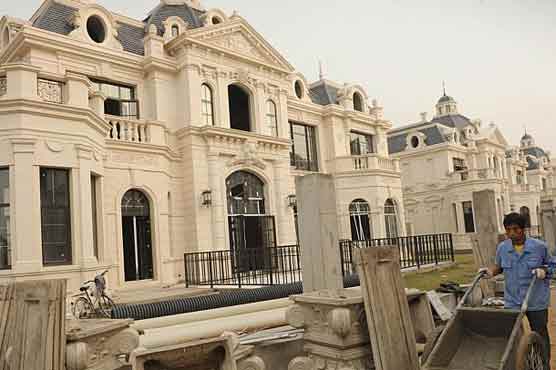 China house prices rise in December