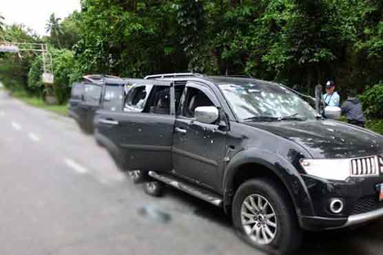 Police among 13 suspects slain in Philippine clash 