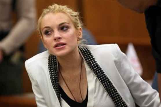 NY prosecutors delay charging Lohan in nightclub clash