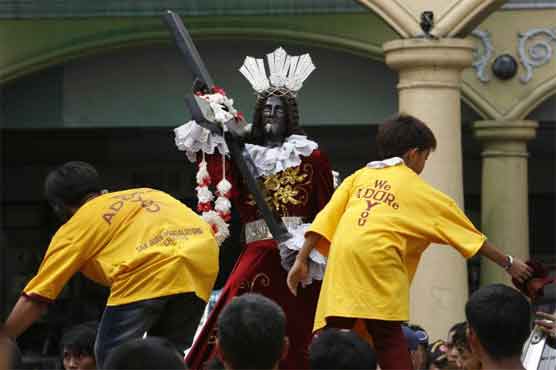 Catholics feel ecstasy for Christ's statue
