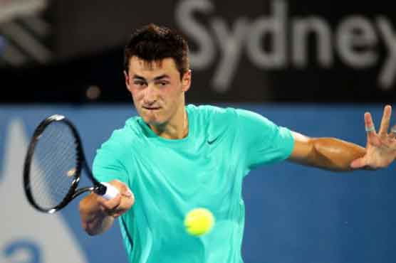 Tomic to play for first title against Anderson