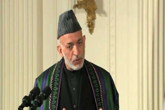 Afghan President Karzai promises will step down in 2014  