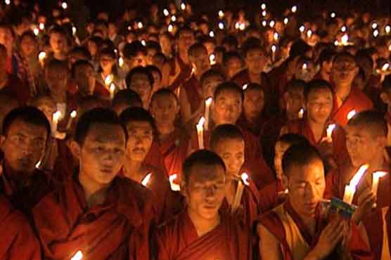 Chinese painter portrays Tibet self-immolators 