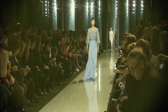 Saab plays it safe with bejeweled couture gowns