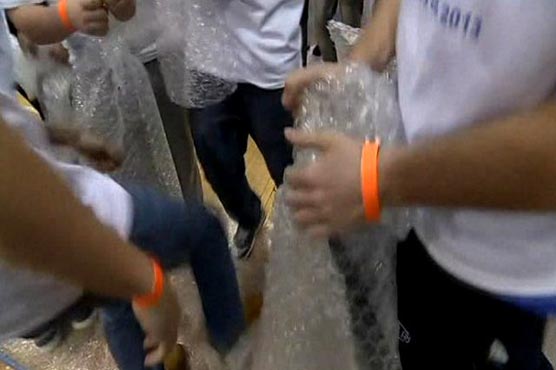 School children set bubble wrap popping record  