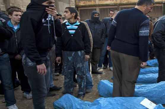 Calls for revenge as Aleppo buries massacre dead