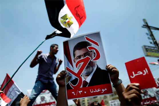 Protesters storm Muslim Brotherhood HQ in Cairo