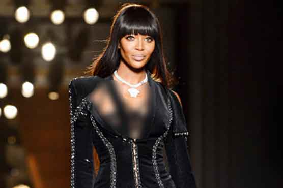Naomi Campbell opens couture week for Versace