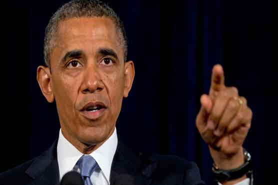 Obama urges Morsi to resolve crisis by talks