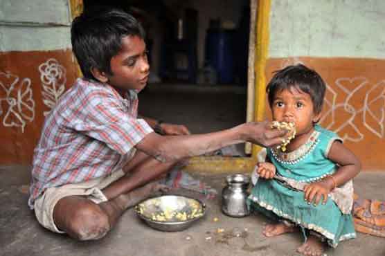 India launches food aid program to feed millions