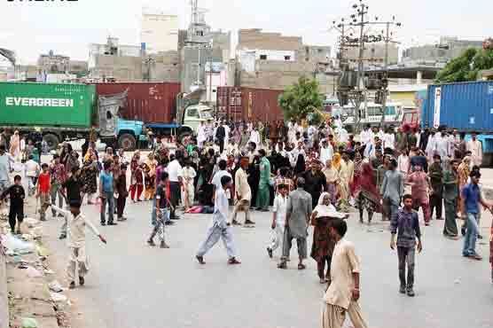 One killed, nine hurt as police, protesters clash in Karachi