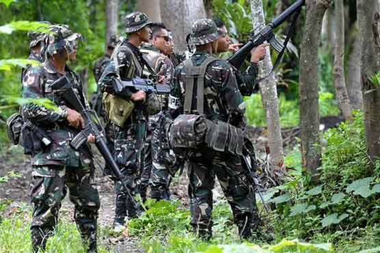 5 Philippine soldiers, scores of rebels killed in clash