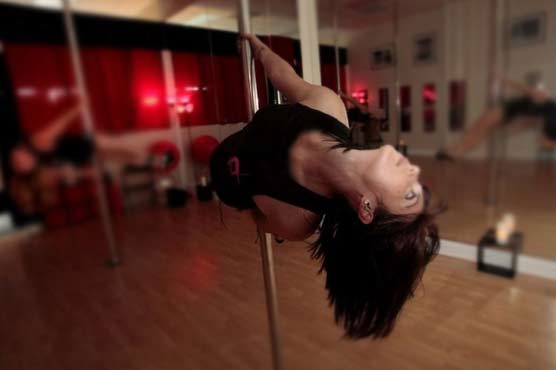 Three Pole dancers surprise passersby 