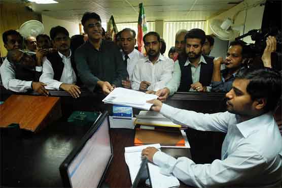 PTI's Asad Umar files his papers for NA 48 