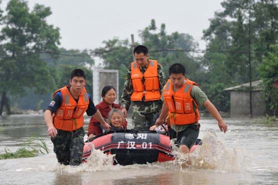 At least 31 people dead in western China flooding