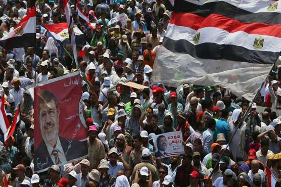 Egyptian parliamentarians demand Morsi's return