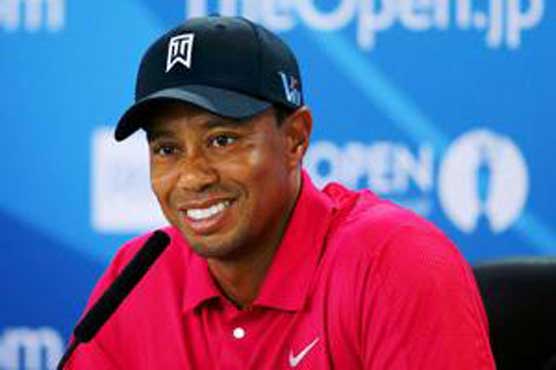 Woods says elbow fine, no loss of confidence