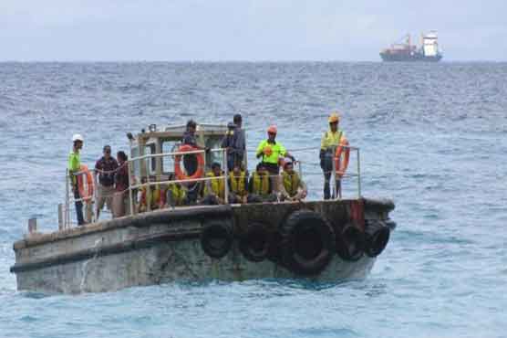 Packed boat capsizes near remote Australian island
