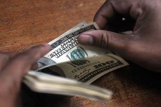 Dollar advances on strong economic data