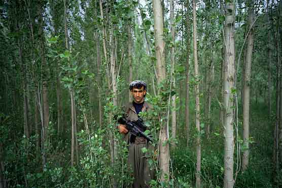 Kurdish rebels warn Turkey on pace of peace talks