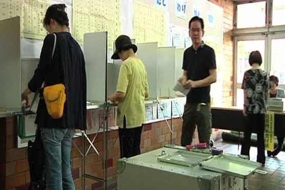 PM Abe bids for stronger hand as Japan votes