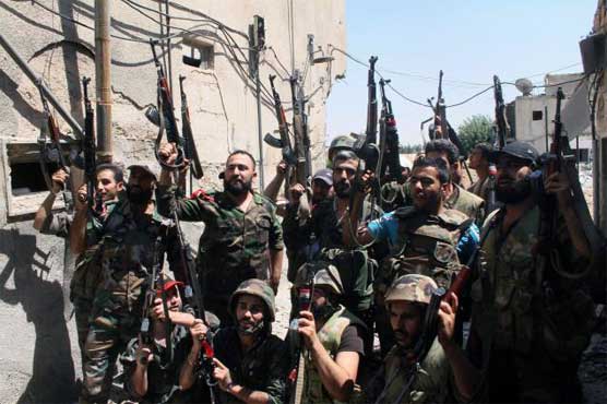 Syrian troops advance in central city