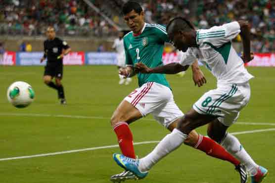 Ten-man Mexico draws 2-2 with Nigeria in friendly 