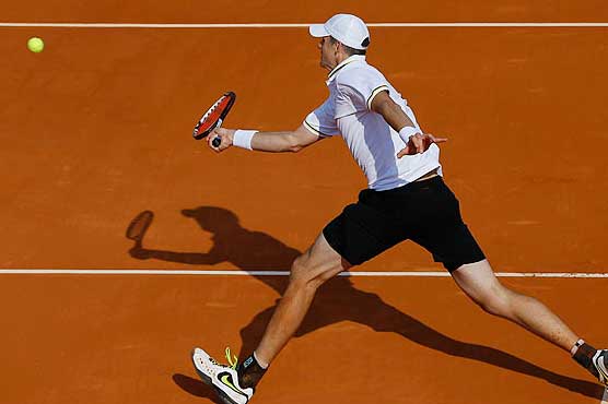 Haas beats Isner at French on 13th match point