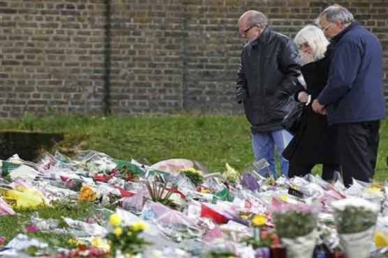 Two men charged with UK soldier's murder appear in court