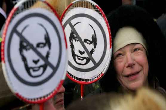 12 go on trial for protest against Putin