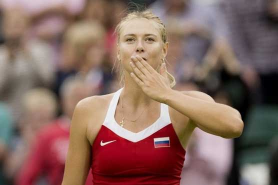 Sharapova rallies past Jankovic at French Open