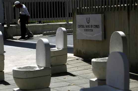 Artist uses toilet humor to protest Cyprus bailout