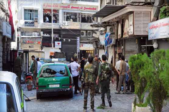 Suicide blasts in Syria kill 14, hurt 30